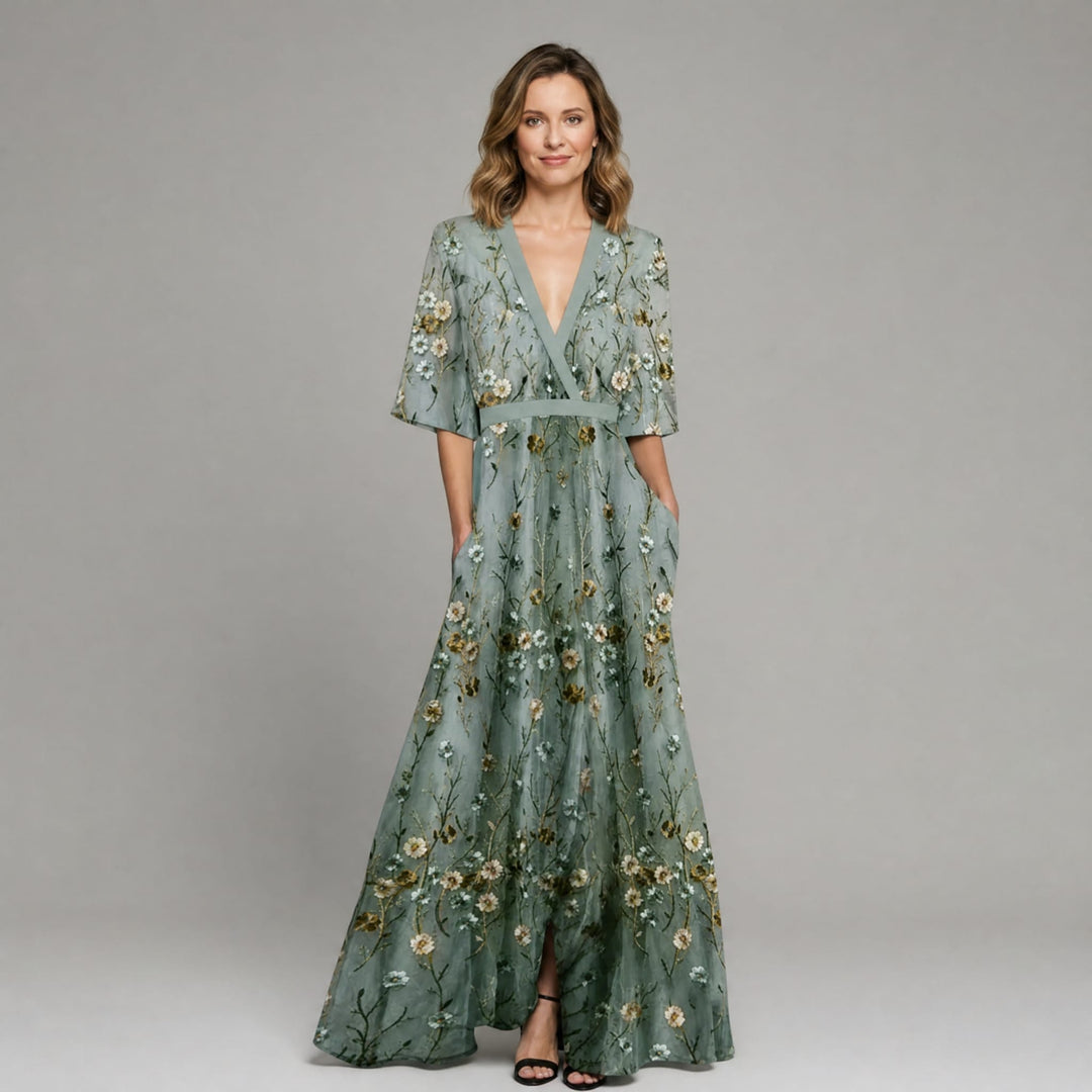 Elegancka Kopertowa Sukienka Maxi w Kwiaty z Dekoltem V i Rękawem 3/4, Rozkloszowana na Wesele i Lato | Sylnia Butik